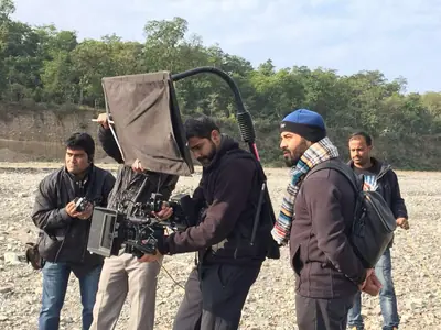 Bappaditya Roy directing a commercial film on set